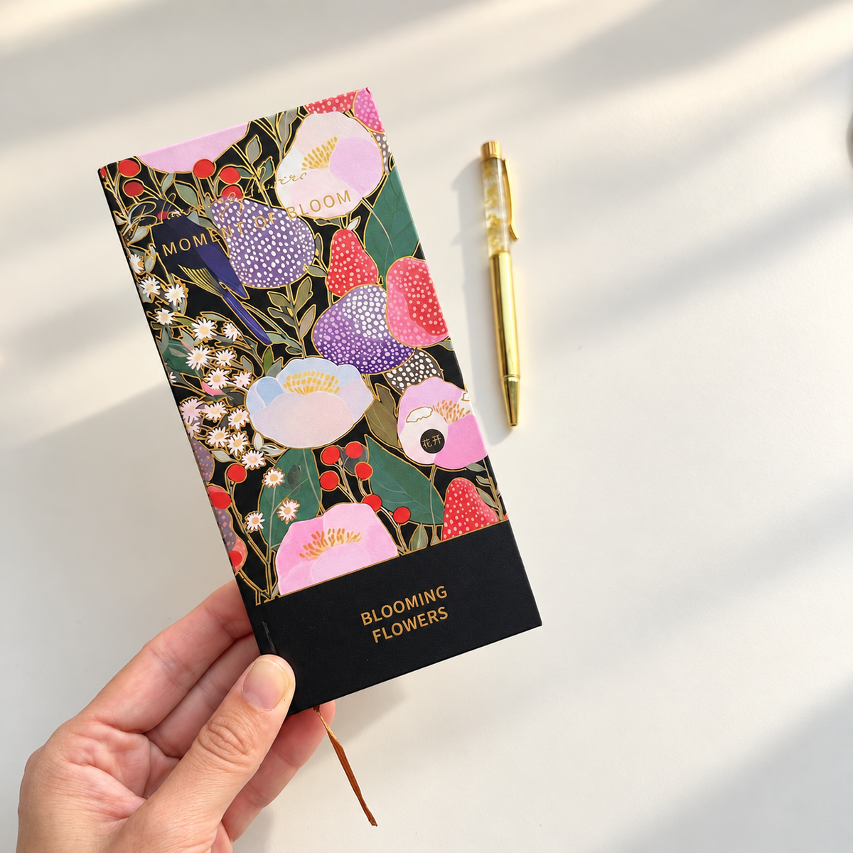 You can choose which notebook will you use in your box with purple items, black notebook, or white notebook with flower