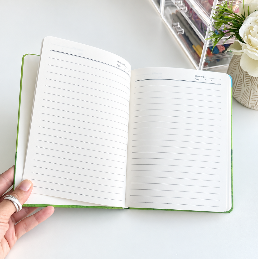 Green A5 lined journal with cute animals, perfect for school, notes and journaling
